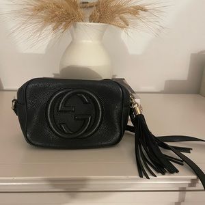 Gucci Soho Disco Bag in black with authenticity tags